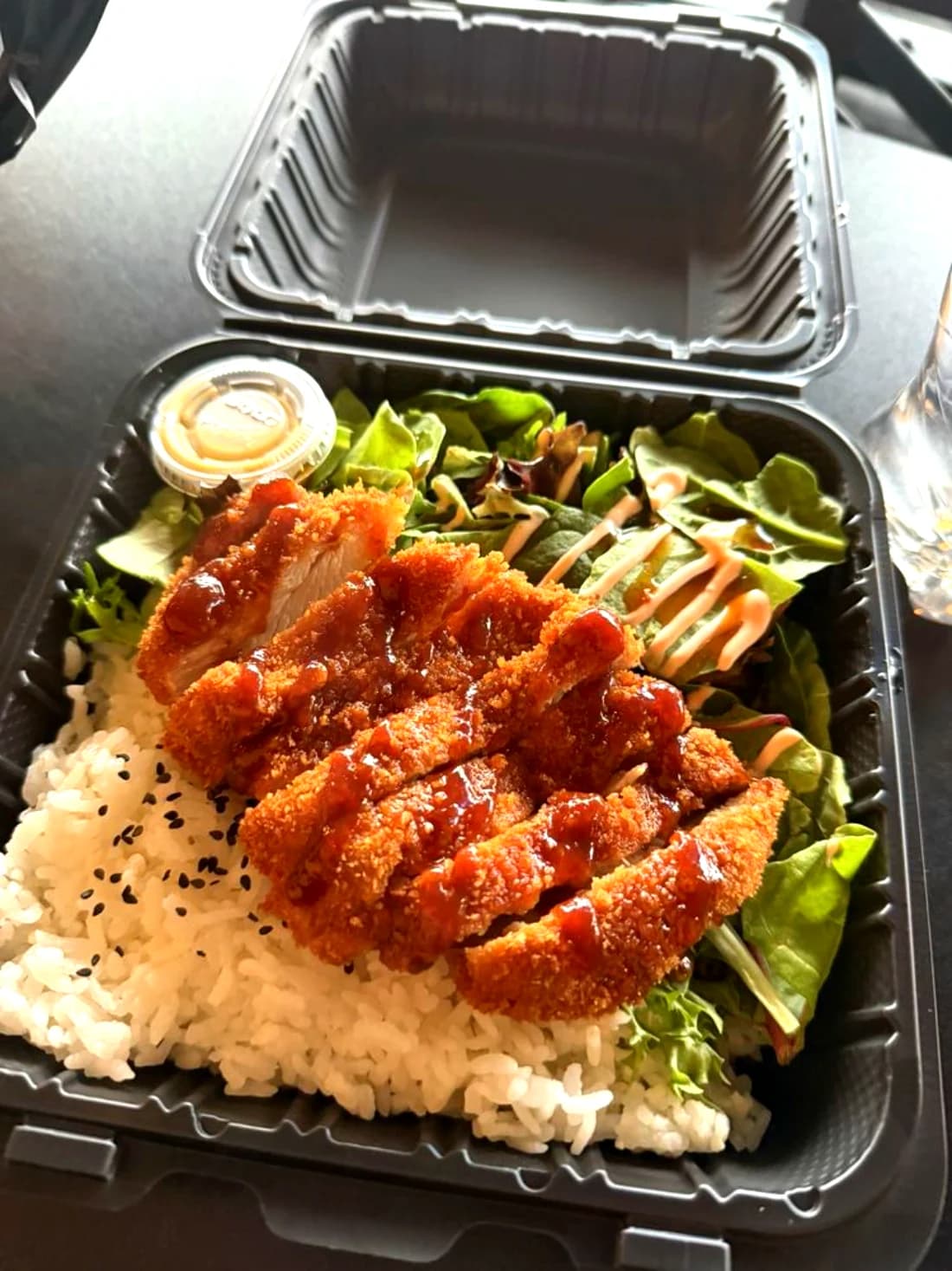 A Chicken Katsu Plate in its takeout box, as served